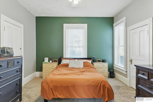 1139 E 5th St, Fremont, NE 68025 - bedroom featuring light colored carpet and baseboards