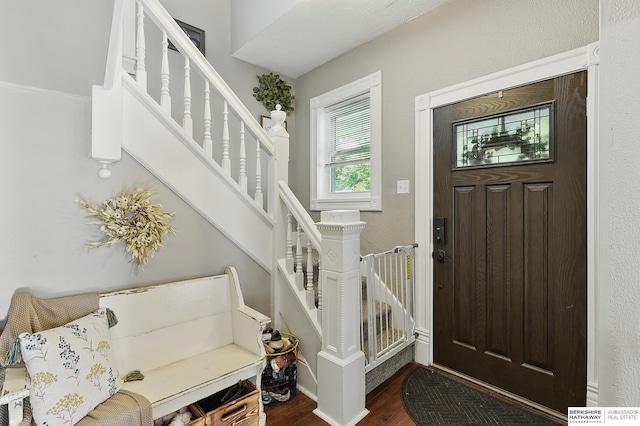 1139 E 5th St, Fremont, NE 68025 - entryway featuring stairway and dark wood-type flooring