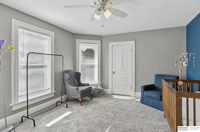1139 E 5th St, Fremont, NE 68025 - carpeted bedroom featuring baseboards and a ceiling fan
