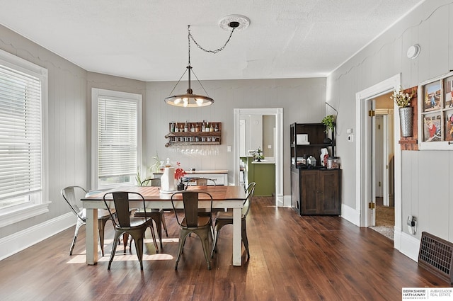 1139 E 5th St, Fremont, NE 68025 - dining space featuring dark wood finished floors and healthy amount of natural light