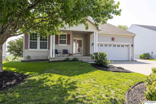 11351 S 198th St, Gretna, NE 68028 - view of front facade with a porch, an attached garage, driveway, and a front lawn