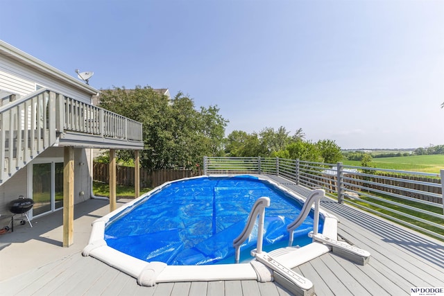 11351 S 198th St, Gretna, NE 68028 - view of swimming pool with a grill and a wooden deck