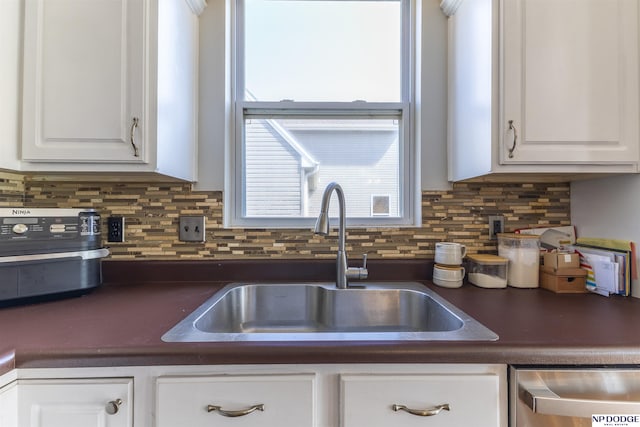 11351 S 198th St, Gretna, NE 68028 - kitchen with dark countertops, dishwasher, white cabinetry, and backsplash