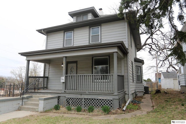 809 S 36th St, Omaha, NE 68105 - american foursquare style home featuring a porch