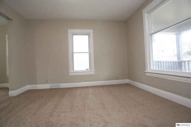 809 S 36th St, Omaha, NE 68105 - unfurnished room with carpet floors