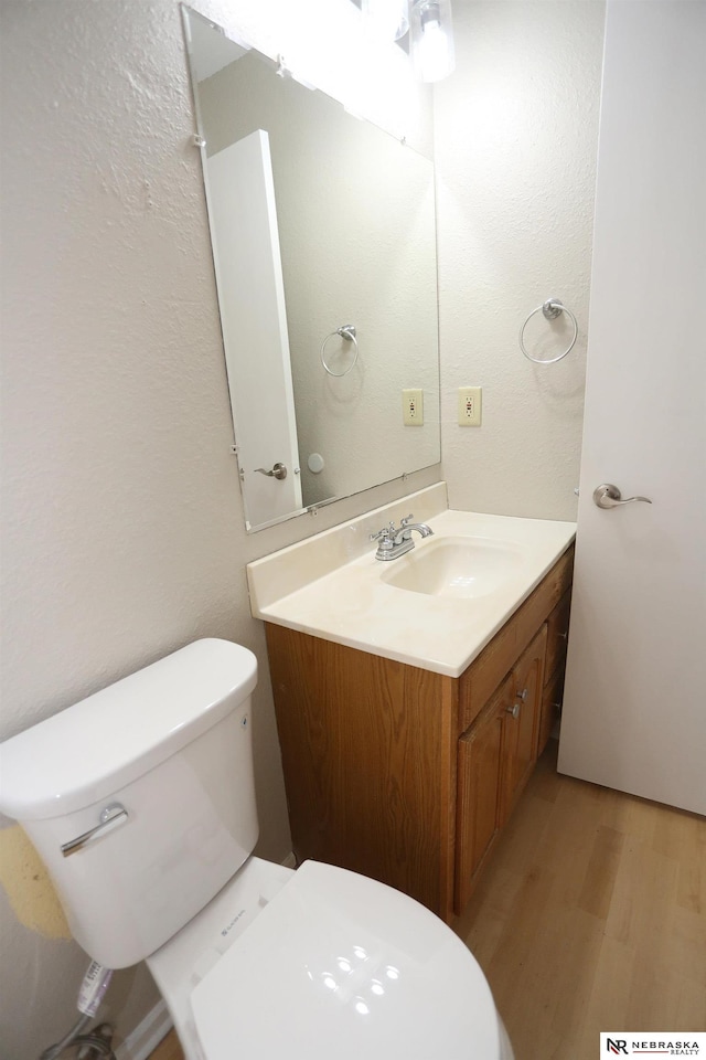 809 S 36th St, Omaha, NE 68105 - half bathroom with wood finished floors and vanity