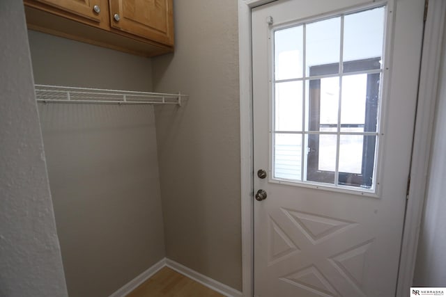 809 S 36th St, Omaha, NE 68105 - entryway with baseboards and light wood finished floors