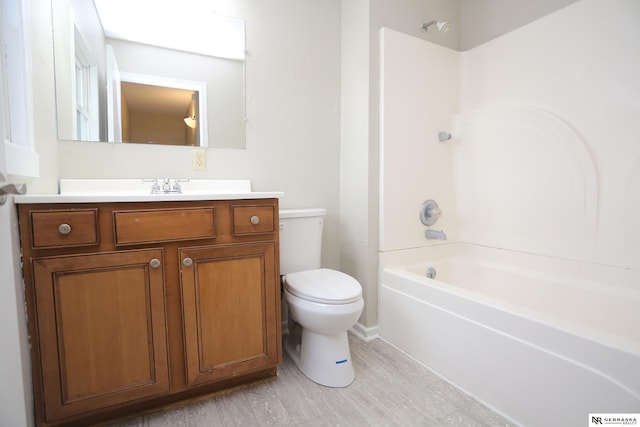 809 S 36th St, Omaha, NE 68105 - bathroom featuring vanity, wood finished floors, and shower / bathtub combination