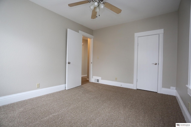 809 S 36th St, Omaha, NE 68105 - unfurnished bedroom with carpet and a ceiling fan