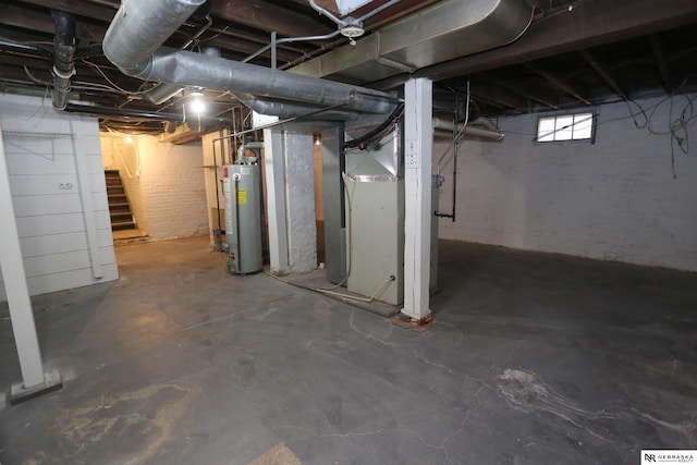 809 S 36th St, Omaha, NE 68105 - below grade area with water heater, stairway, and heating unit
