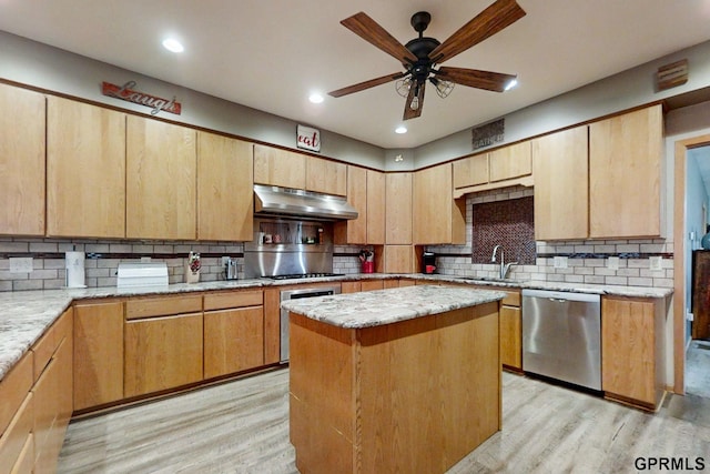 2035 355th Ave, Farragut, IA 51639 - kitchen featuring stainless steel dishwasher, under cabinet range hood, light wood finished floors, decorative backsplash, and recessed lighting