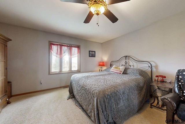 2035 355th Ave, Farragut, IA 51639 - bedroom featuring light colored carpet and ceiling fan
