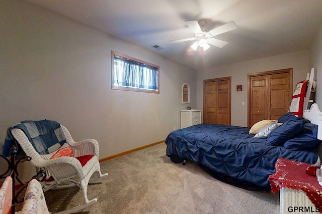 2035 355th Ave, Farragut, IA 51639 - bedroom with carpet flooring, two closets, and ceiling fan