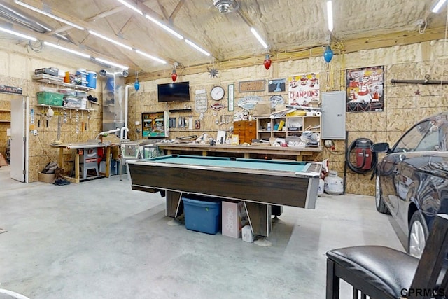 2035 355th Ave, Farragut, IA 51639 - recreation room featuring a workshop area, electric panel, concrete flooring, and billiards