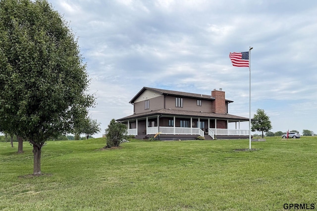 2035 355th Ave, Farragut, IA 51639 - farmhouse-style home with a porch, a chimney, a front yard, and roof with shingles