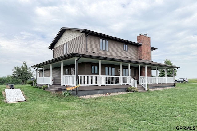 2035 355th Ave, Farragut, IA 51639 - back of house featuring a porch, a chimney, and a yard