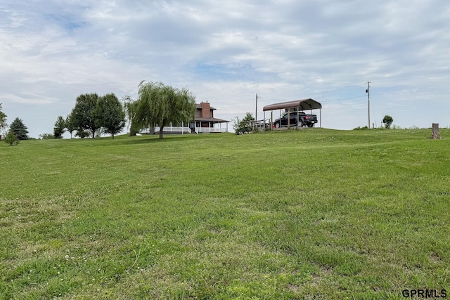 2035 355th Ave, Farragut, IA 51639 - view of green lawn with a detached carport