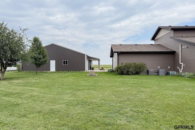 2035 355th Ave, Farragut, IA 51639 - view of green lawn featuring an outbuilding and an outdoor structure