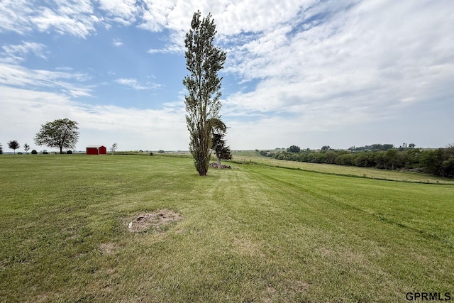 2035 355th Ave, Farragut, IA 51639 - view of grassy yard featuring an outdoor structure and a view of countryside