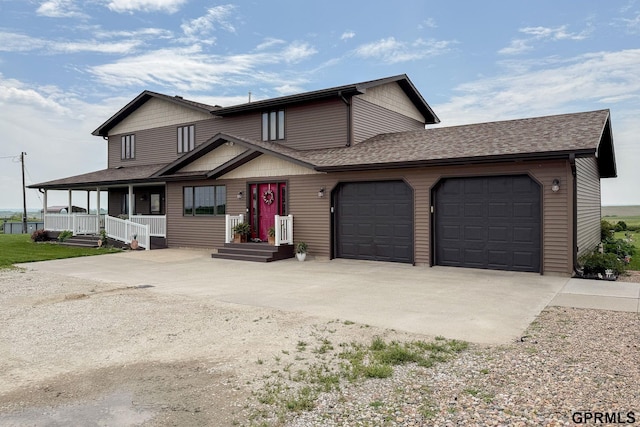 2035 355th Ave, Farragut, IA 51639 - view of front of home featuring concrete driveway, an attached garage, and a shingled roof