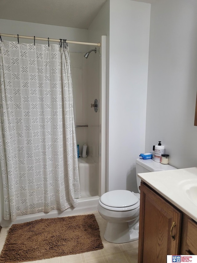 1177 N Columbia Ave, Seward, NE 68434 - full bath with a shower with shower curtain, vanity, and tile patterned flooring