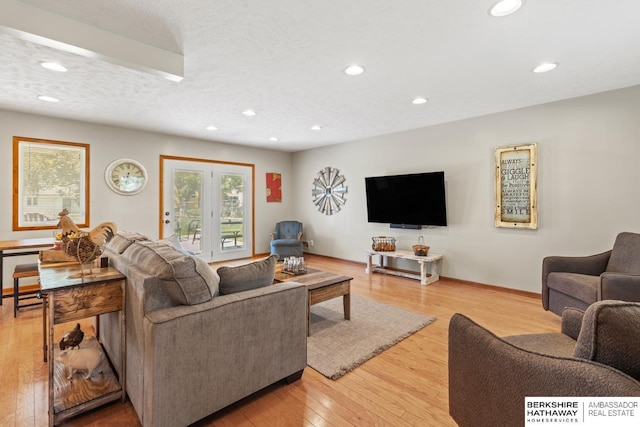 8832 Spaulding Cir, Omaha, NE 68134 - living room with plenty of natural light, recessed lighting, and light wood-style floors
