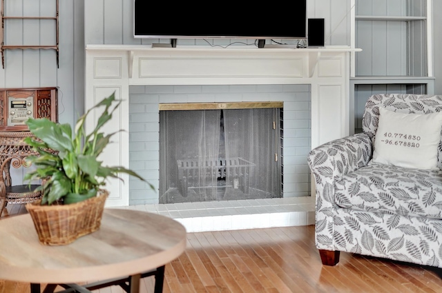 3001 Oreilly Dr, Lincoln, NE 68502 - detailed view of a fireplace with raised hearth and wood finished floors