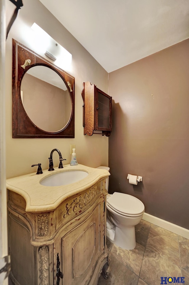 3001 Oreilly Dr, Lincoln, NE 68502 - bathroom featuring toilet and vanity