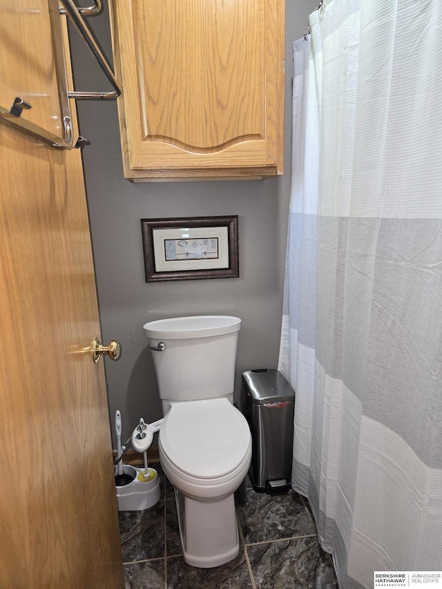 1002 Oak Ct, Plattsmouth, NE 68048 - full bathroom with marble finish flooring and toilet