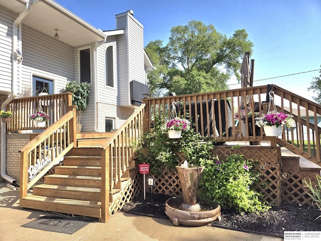 1002 Oak Ct, Plattsmouth, NE 68048 - wooden deck with stairway