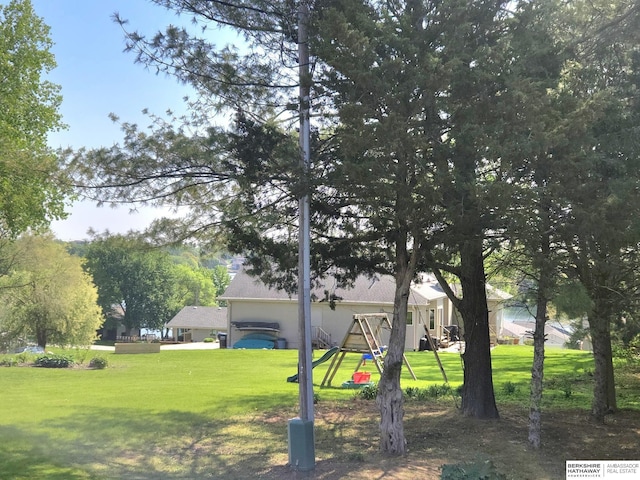 1002 Oak Ct, Plattsmouth, NE 68048 - view of green lawn with a playground