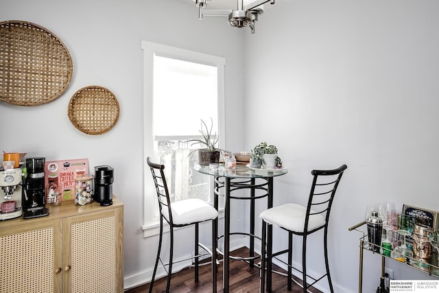 4814 Poppleton Ave, Omaha, NE 68106 - dining room featuring wood finished floors and a chandelier