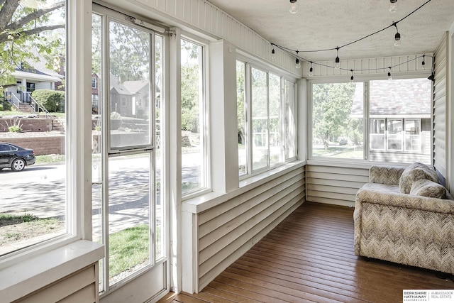 4814 Poppleton Ave, Omaha, NE 68106 - sunroom / solarium with hardwood / wood-style flooring and a textured ceiling
