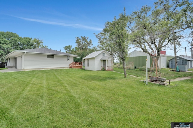 19354 SW 117th Rd, Dewitt, NE 68341 - view of grassy yard with an outbuilding