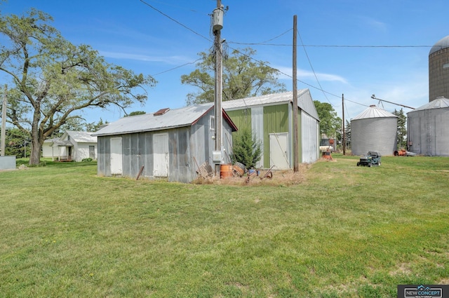 19354 SW 117th Rd, Dewitt, NE 68341 - view of grassy yard featuring an outbuilding and a pole building