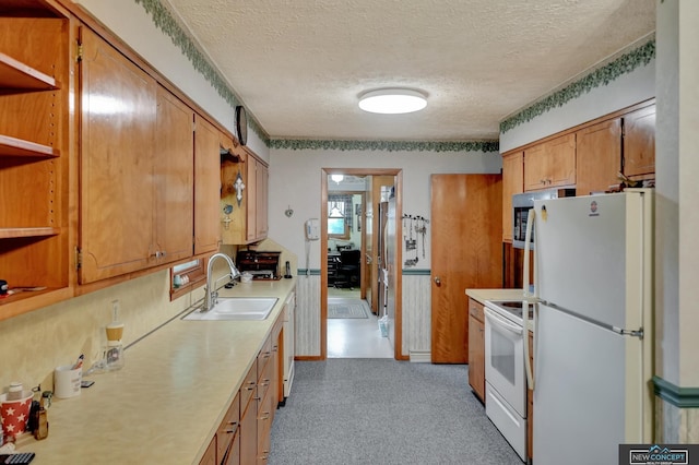 19354 SW 117th Rd, Dewitt, NE 68341 - kitchen with white appliances, light countertops, a textured ceiling, open shelves, and brown cabinetry
