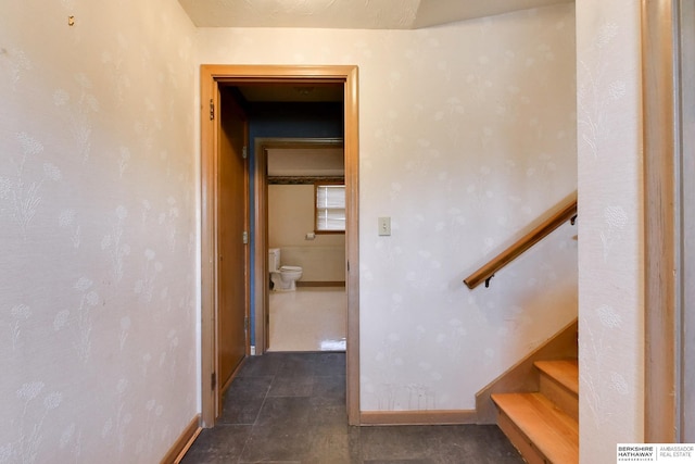 12102 Westover Rd, Omaha, NE 68154 - stairway with baseboards and tile patterned flooring
