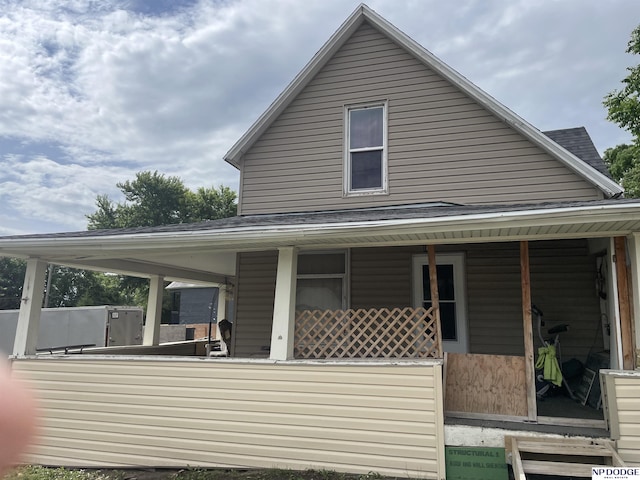 2711 Shirley St, Omaha, NE 68105 - rear view of house featuring a porch