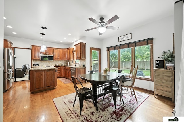 5807 S 167th Ave, Omaha, NE 68135 - dining space featuring light wood-style flooring, ceiling fan, and recessed lighting
