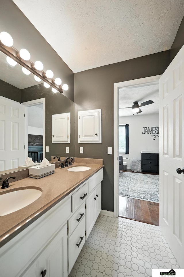 5807 S 167th Ave, Omaha, NE 68135 - full bath with double vanity and a textured ceiling