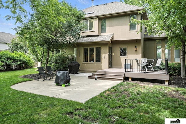 5807 S 167th Ave, Omaha, NE 68135 - rear view of house with roof with shingles, a patio area, and a deck