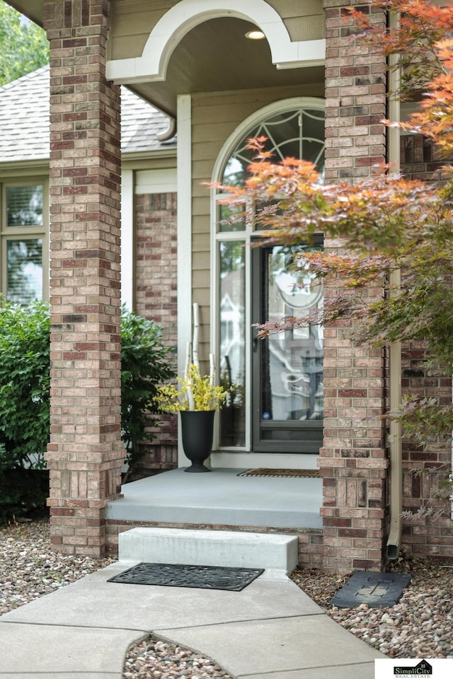 5807 S 167th Ave, Omaha, NE 68135 - doorway to property with brick siding
