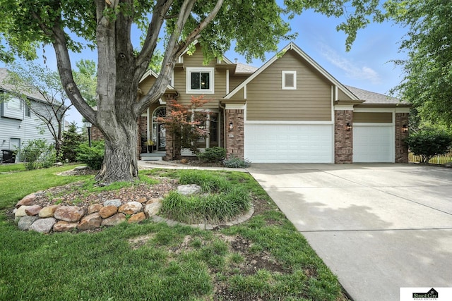 5807 S 167th Ave, Omaha, NE 68135 - view of front facade with brick siding, a garage, concrete driveway, and a front lawn
