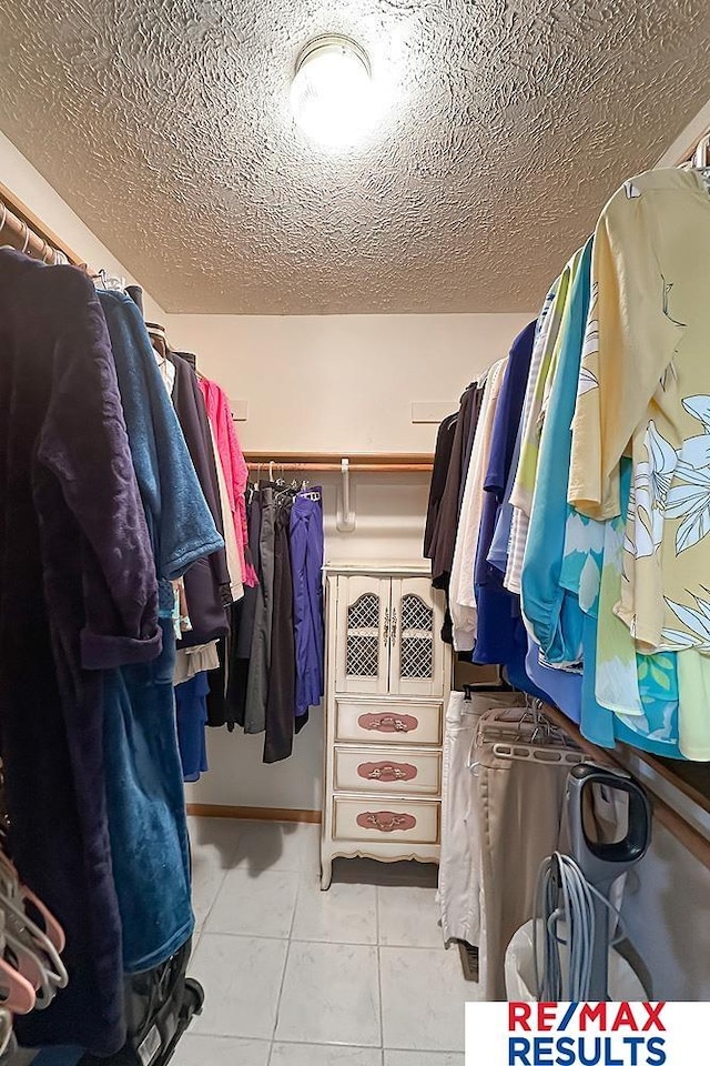 17315 M St, Omaha, NE 68135 - walk in closet featuring tile patterned floors