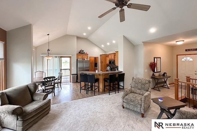 21204 Hampton Dr, Gretna, NE 68028 - living area featuring ceiling fan, high vaulted ceiling, and recessed lighting