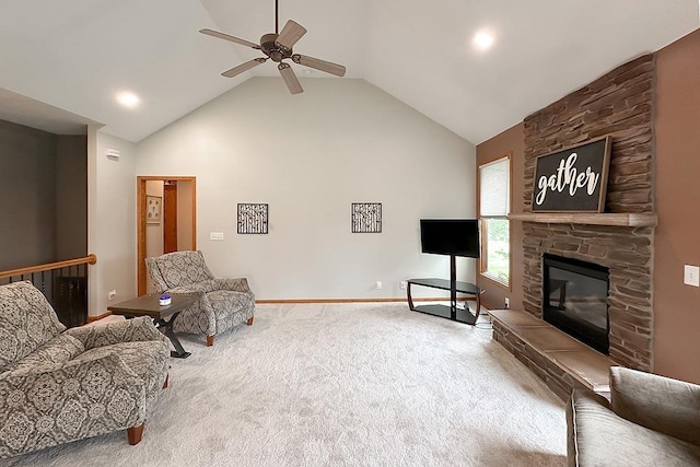 21204 Hampton Dr, Gretna, NE 68028 - living room with ceiling fan, carpet floors, a stone fireplace, and high vaulted ceiling