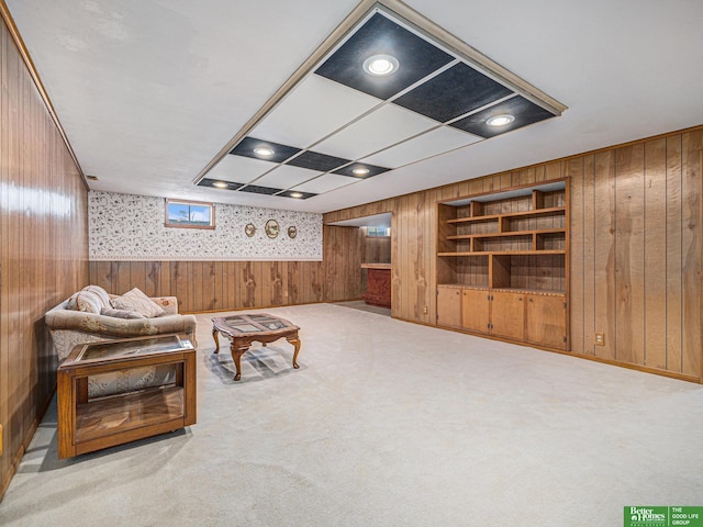 4015 Arbor St, Omaha, NE 68105 - carpeted living room with wooden walls and wallpapered walls