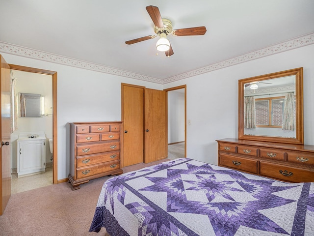 4015 Arbor St, Omaha, NE 68105 - bedroom with light carpet, a closet, ensuite bathroom, and ceiling fan