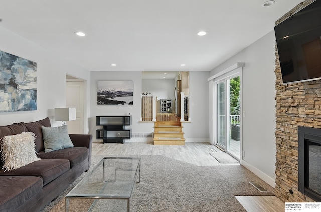 935 S 150th St, Omaha, NE 68154 - living room with a fireplace, recessed lighting, and wood finished floors