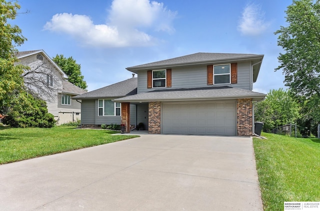 935 S 150th St, Omaha, NE 68154 - view of front of home featuring driveway, an attached garage, a front yard, brick siding, and roof with shingles